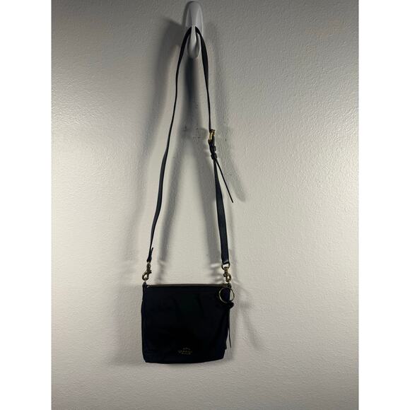 Coach Handbags - Designer x Coach A2022-868 Nylon/Leather Crossbody bag w/ Purple Floral Lining